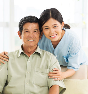 asian caregiver with her old man patient